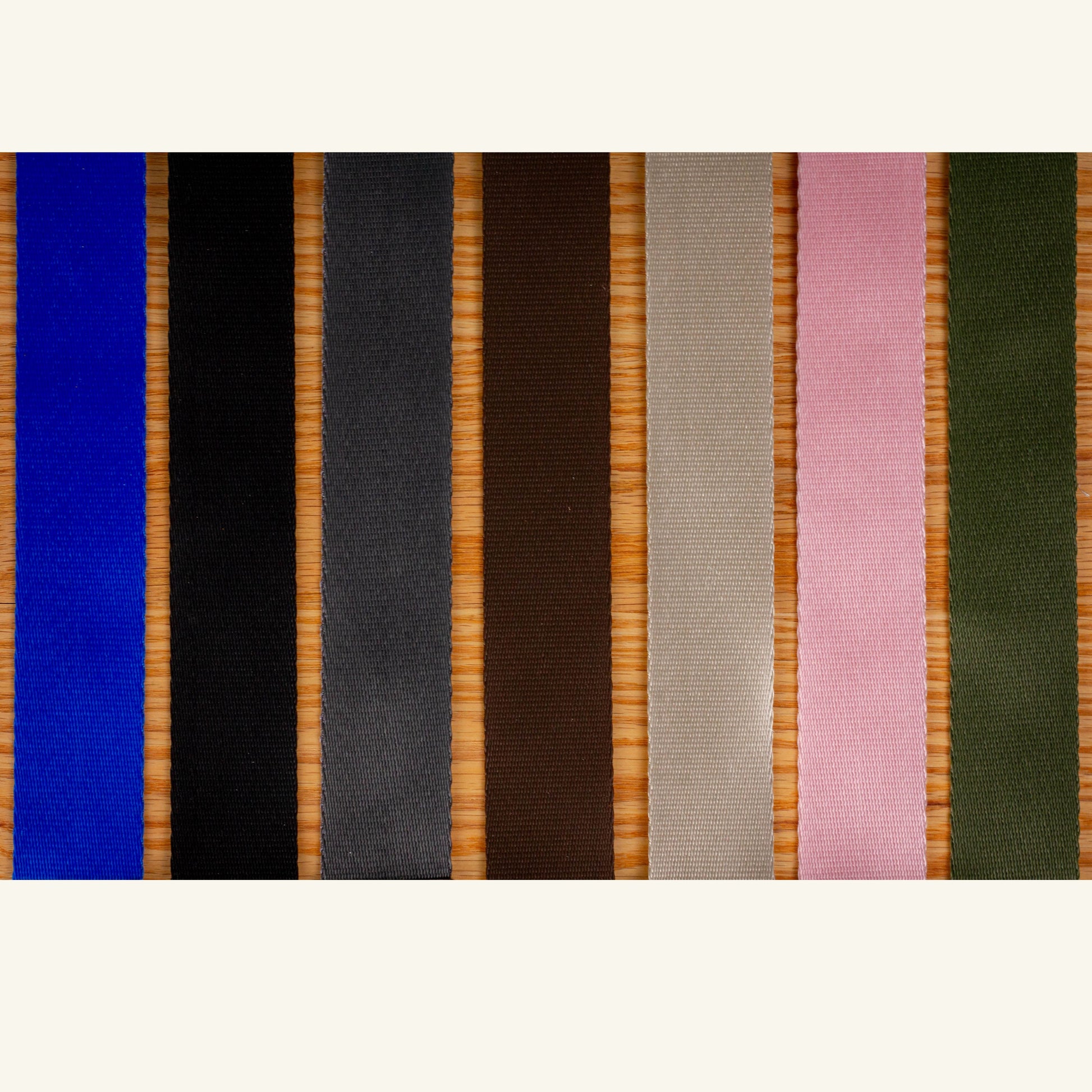 Set of colorful ribbons arranged in a row on a white background